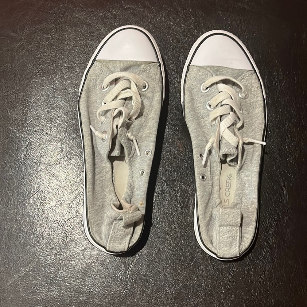 Gray athletic shoes